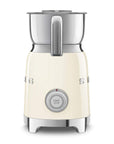 Side view of cream Smeg 50s retro line milk frother with a control dial displayed on a white background