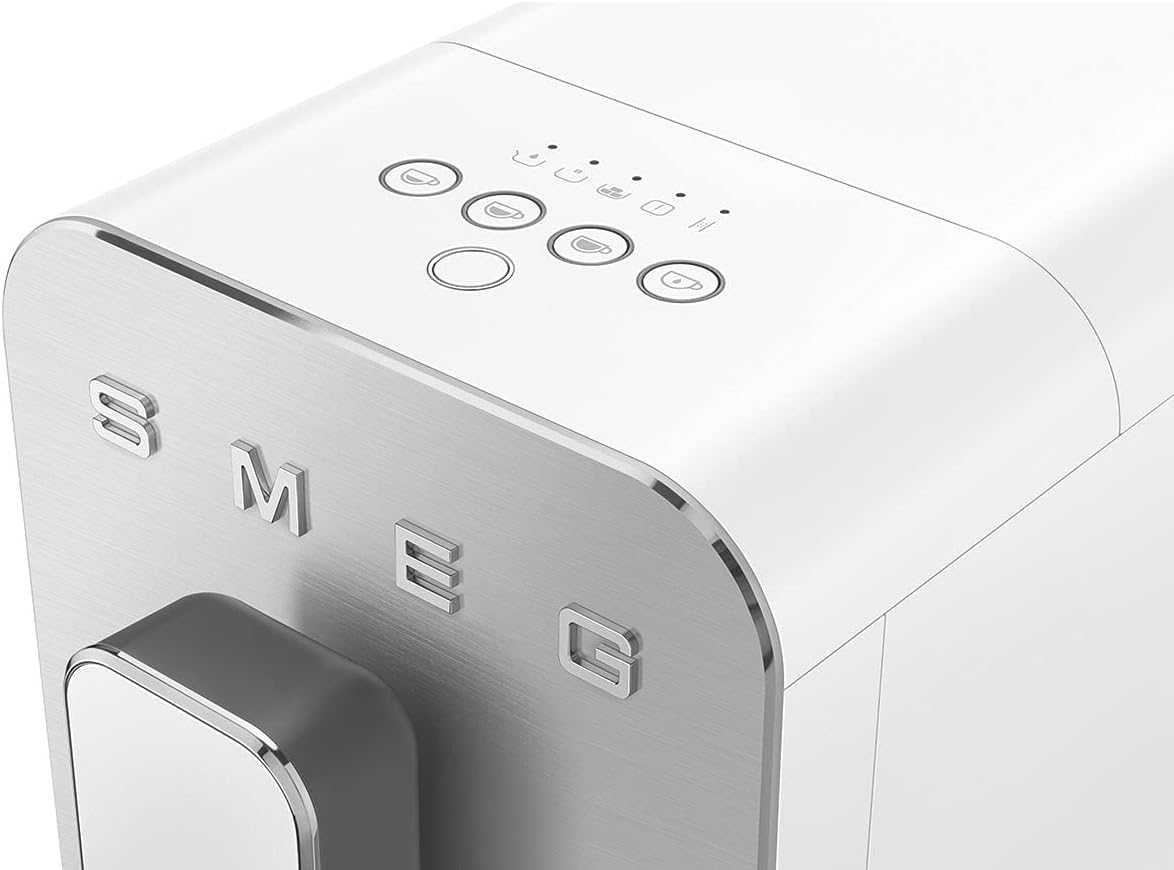Close-up of a Smeg coffee maker with control panel and logo.