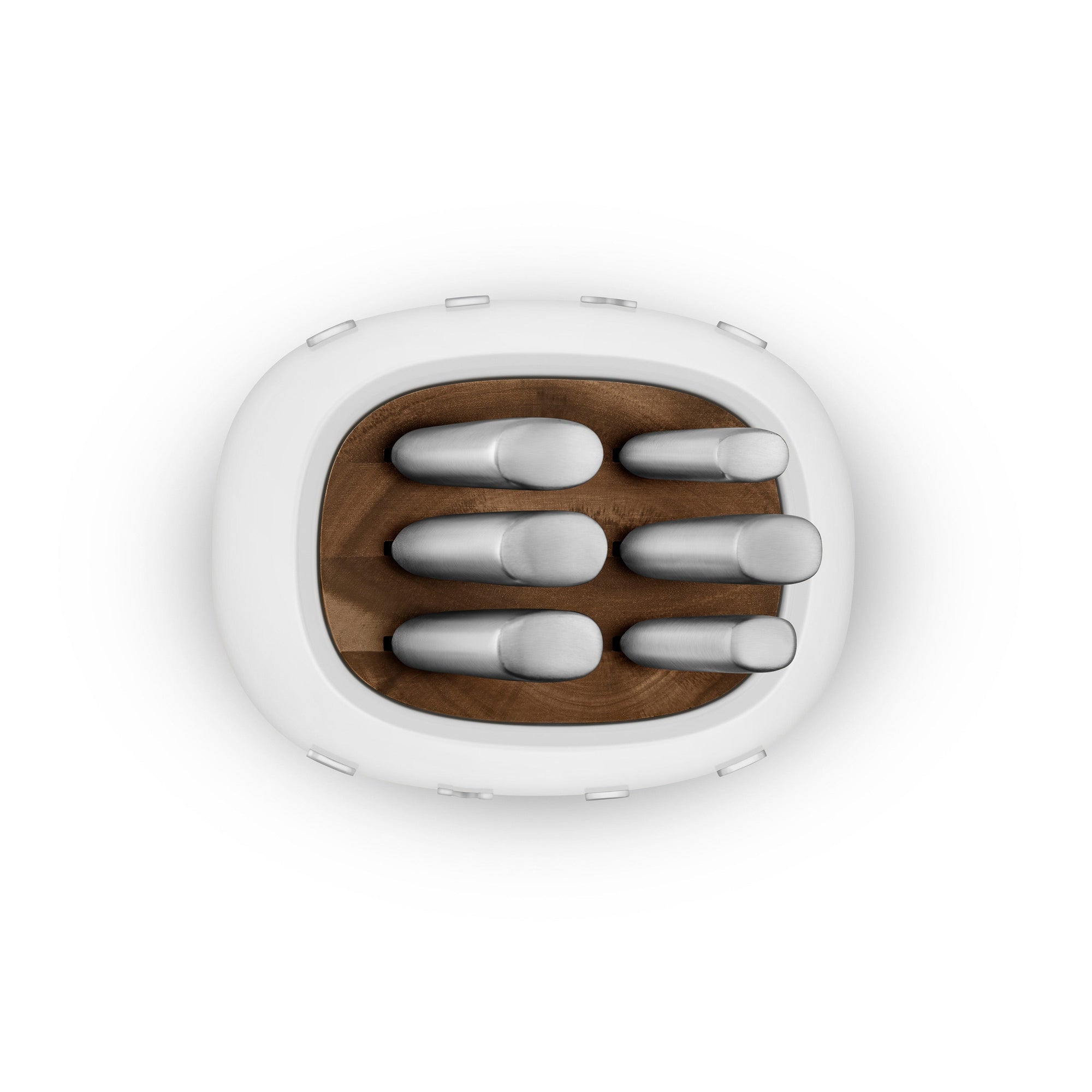 SMEG White knife block top view with knives in it on a white background