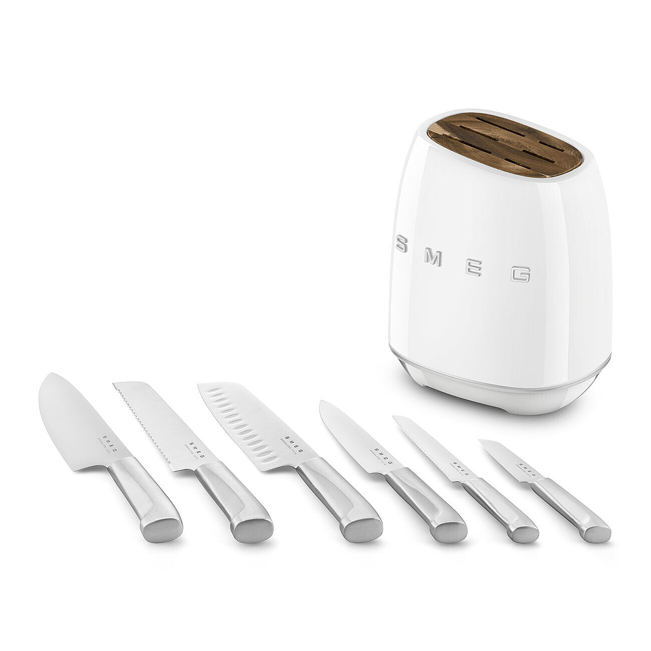 White Smeg knife block next to an assortment of knives lined up in a row displayed on a white background