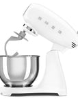 White stand mixer with stainless steel bowl on a white background