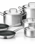 Set of nonstick cookware including pots, pans, and lids on a white background