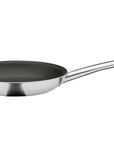 Stainless steel frying pan with a black non-stick surface on a white background
