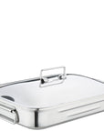 Stainless steel roasting pan with a lid on a white background