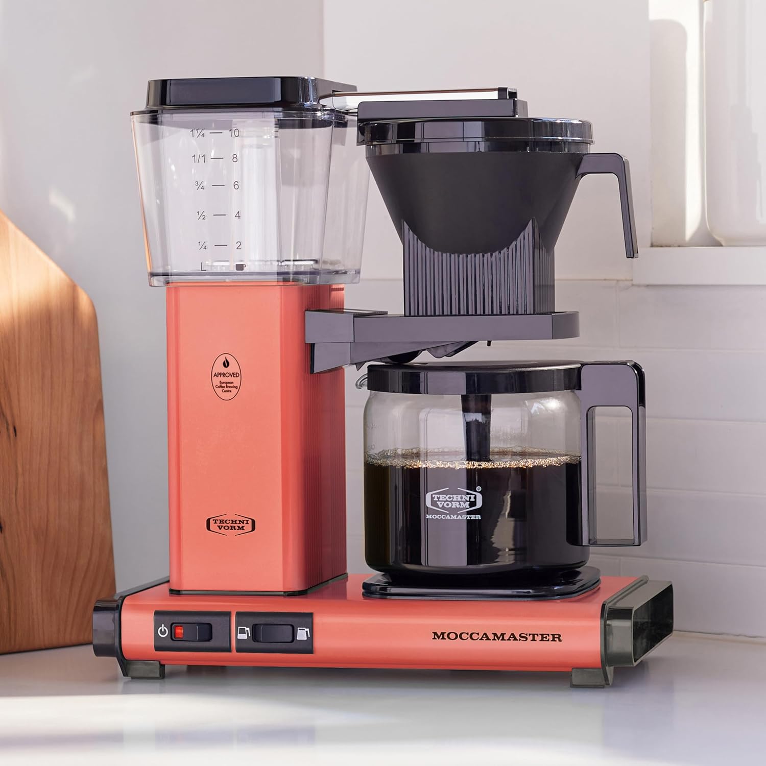 Sorbet Moccamaster coffee maker on a kitchen counter with a white background