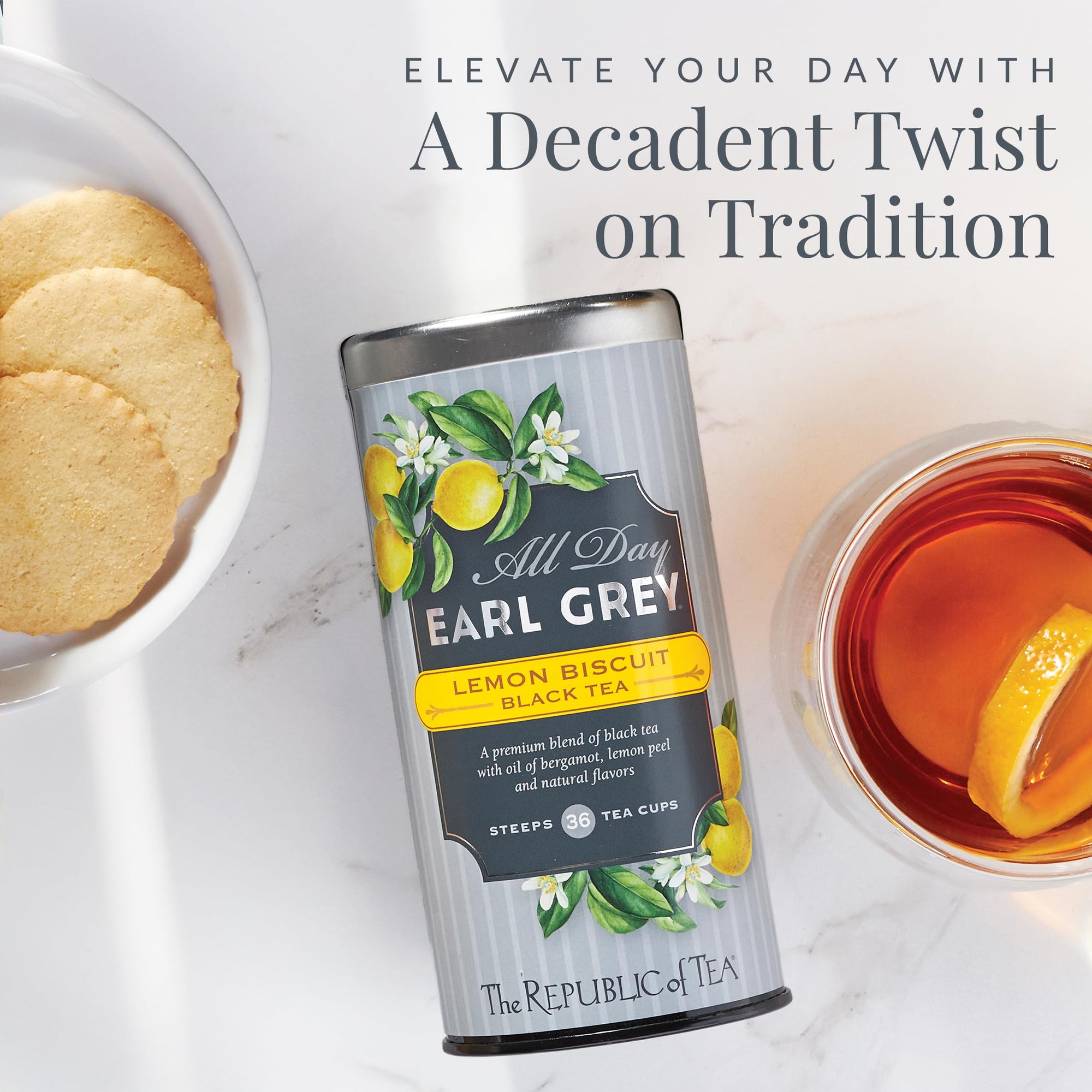 Tea canister labeled 'All Day Earl Grey' with lemon and biscuit design, surrounded by tea and cookies.