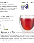 Tea product information with a glass of red tea and certification logo.