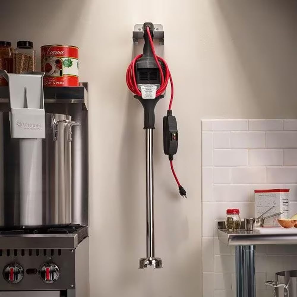 Wall-mounted red and black electric blender in a kitchen setting.