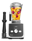 Vitamix blender with fruit ingredients on a white background