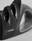 Wüsthof knife sharpener on a gray background
