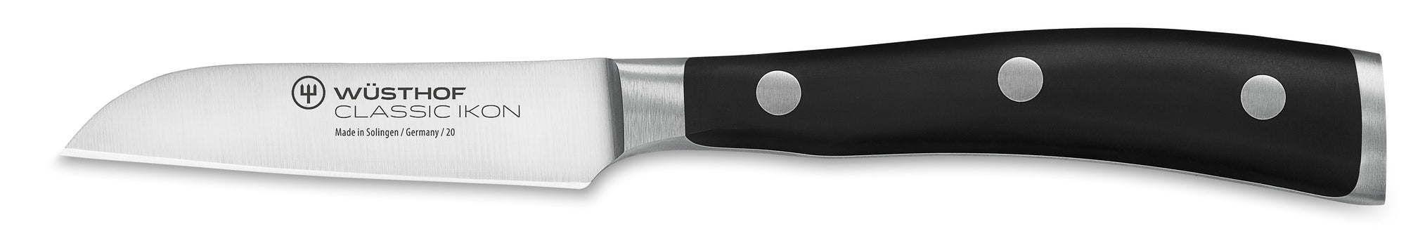 Wüsthof knife with black handle on a white background