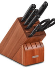 7 piece knife block set with the knives inserted into the knife block displayed on a white background